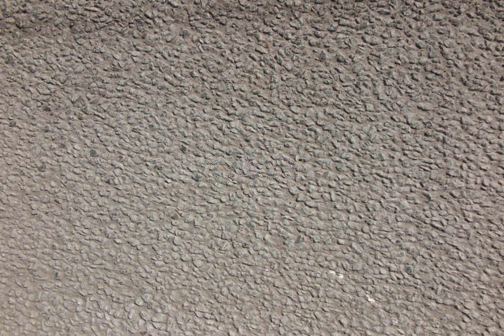Поверхность защитного слоя бетона